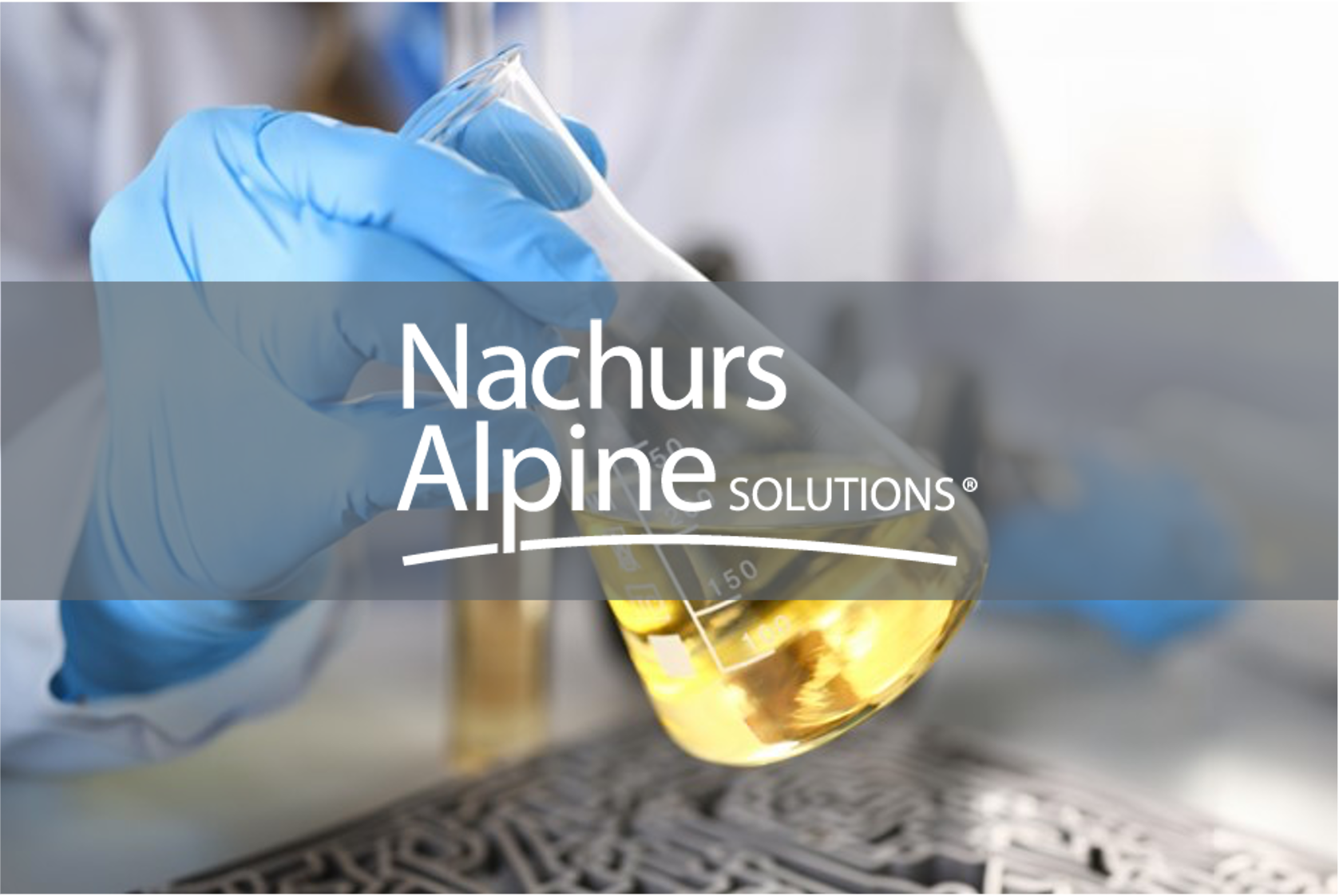This is an image of a chemist wearing blue gloves testing a gold colored solution within a beaker. The Nachurs Alpine Solutions logo is overtop of the image.